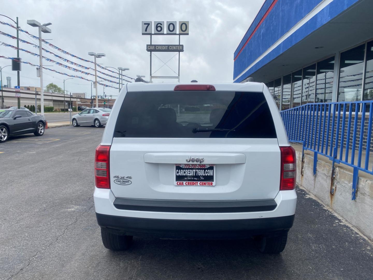 2014 WHITE Jeep Patriot Sport 4WD (1C4NJRBB2ED) with an 2.4L L4 DOHC 16V engine, located at 7600 S Western Ave., Chicago, IL, 60620, (773) 918-3980, 0.000000, 0.000000 - Photo#2